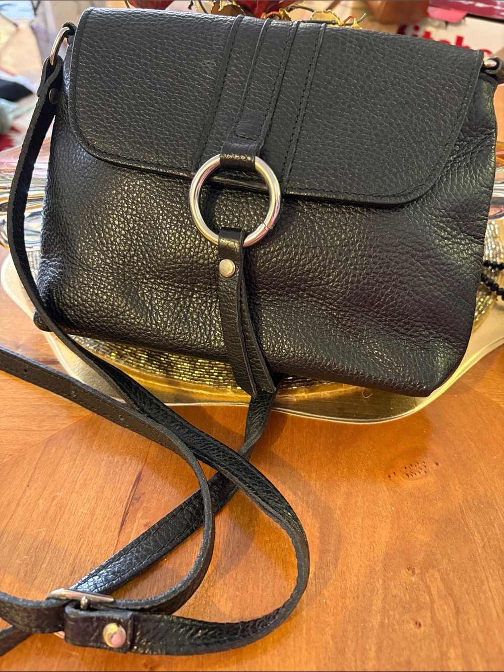 Black Pebbled Leather Crossbody Bag with Silver Ring Accent